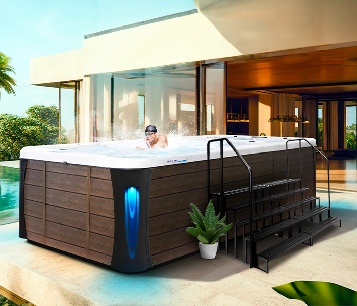 Calspas hot tub being used in a family setting - Ames